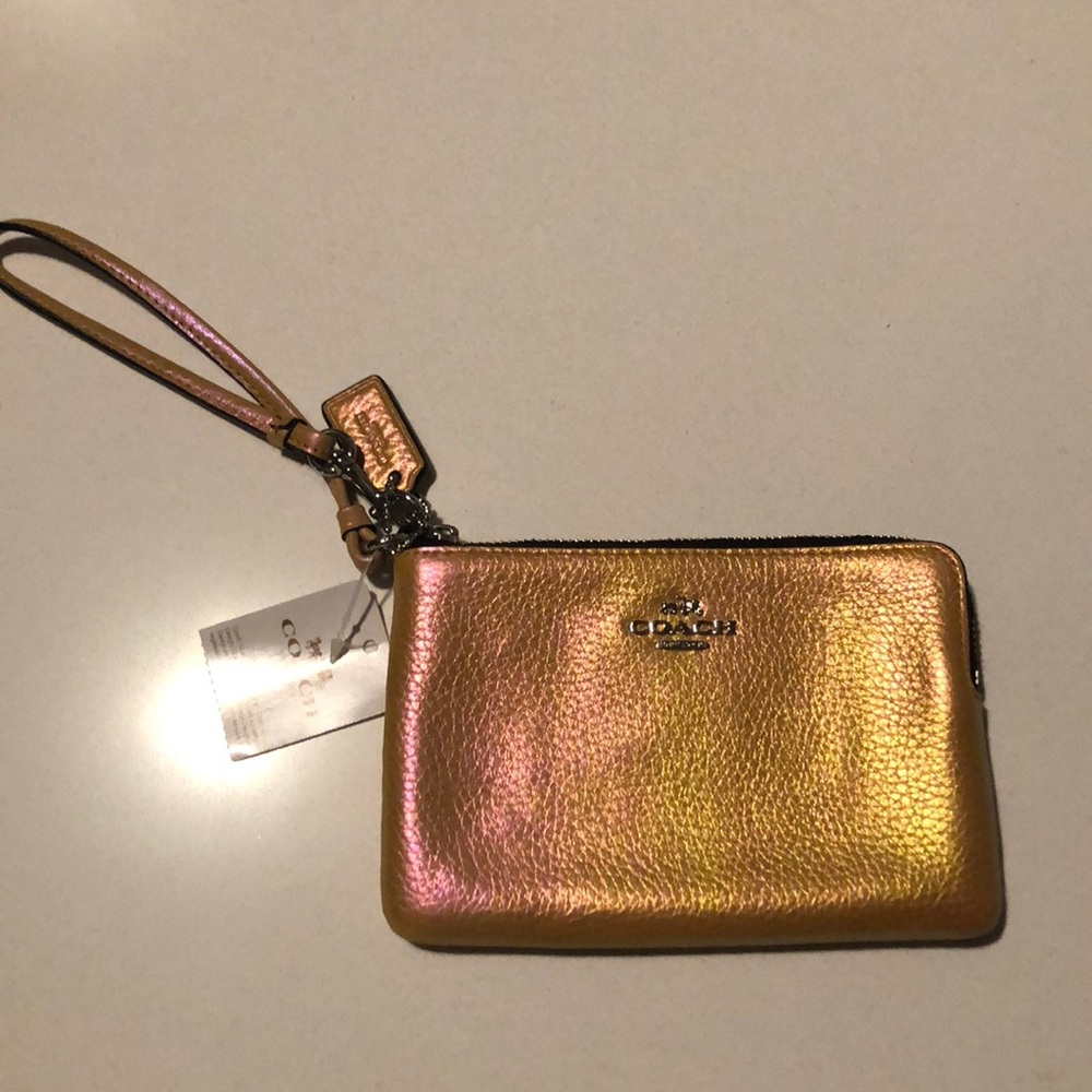 Coach wristlet: NEW WITH TAGS. Hologram corner zip